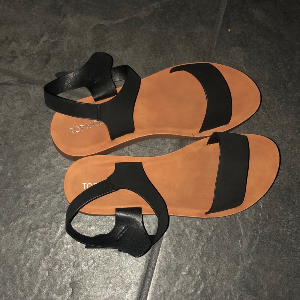 Blacked strapped on sandals